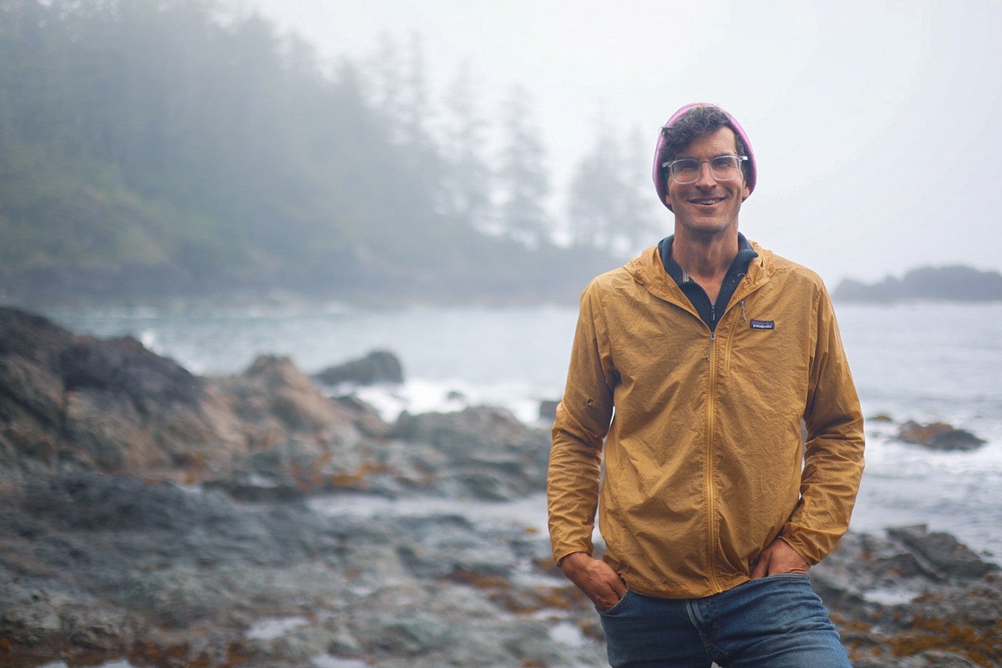 David Meek Standing in front of the ocean